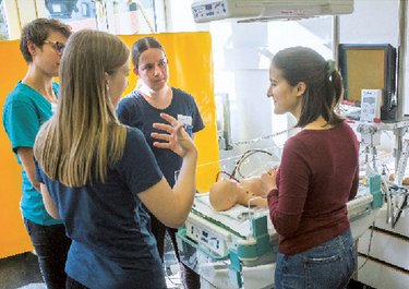 Medical students discussing in a simulation exercise