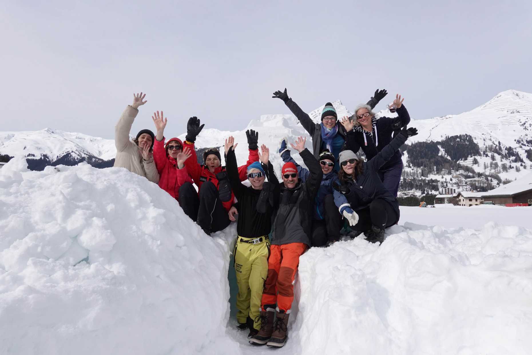 Happy team in winter landscape